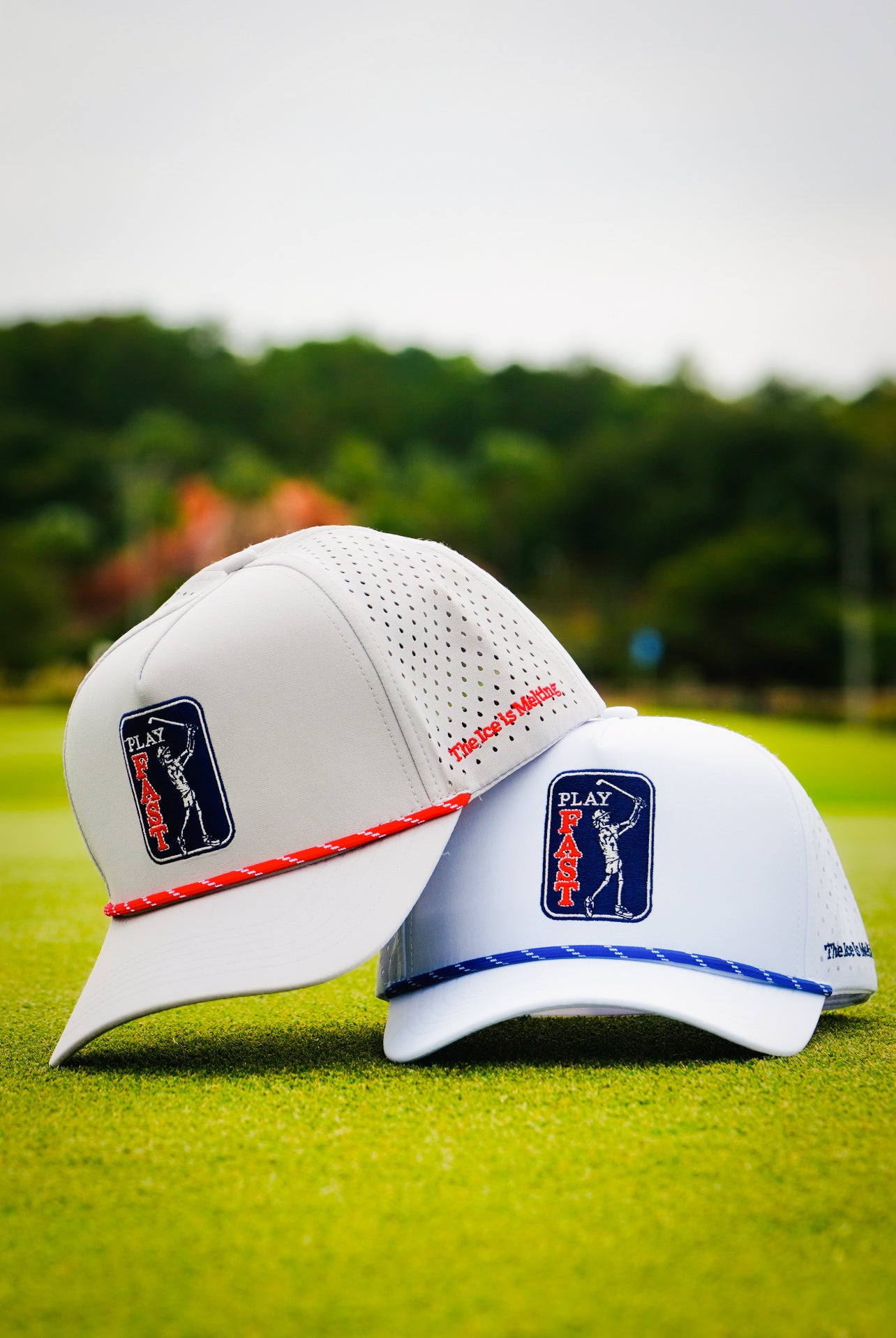 red and blue play fast hats on golf grass