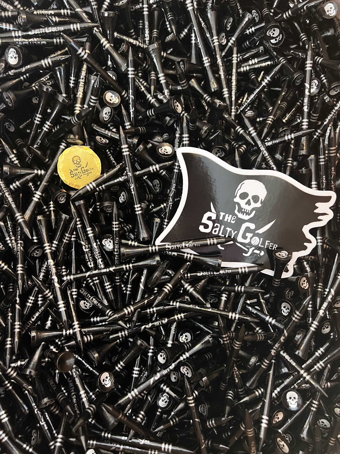 Salty’s gold ballmarker and tee pack