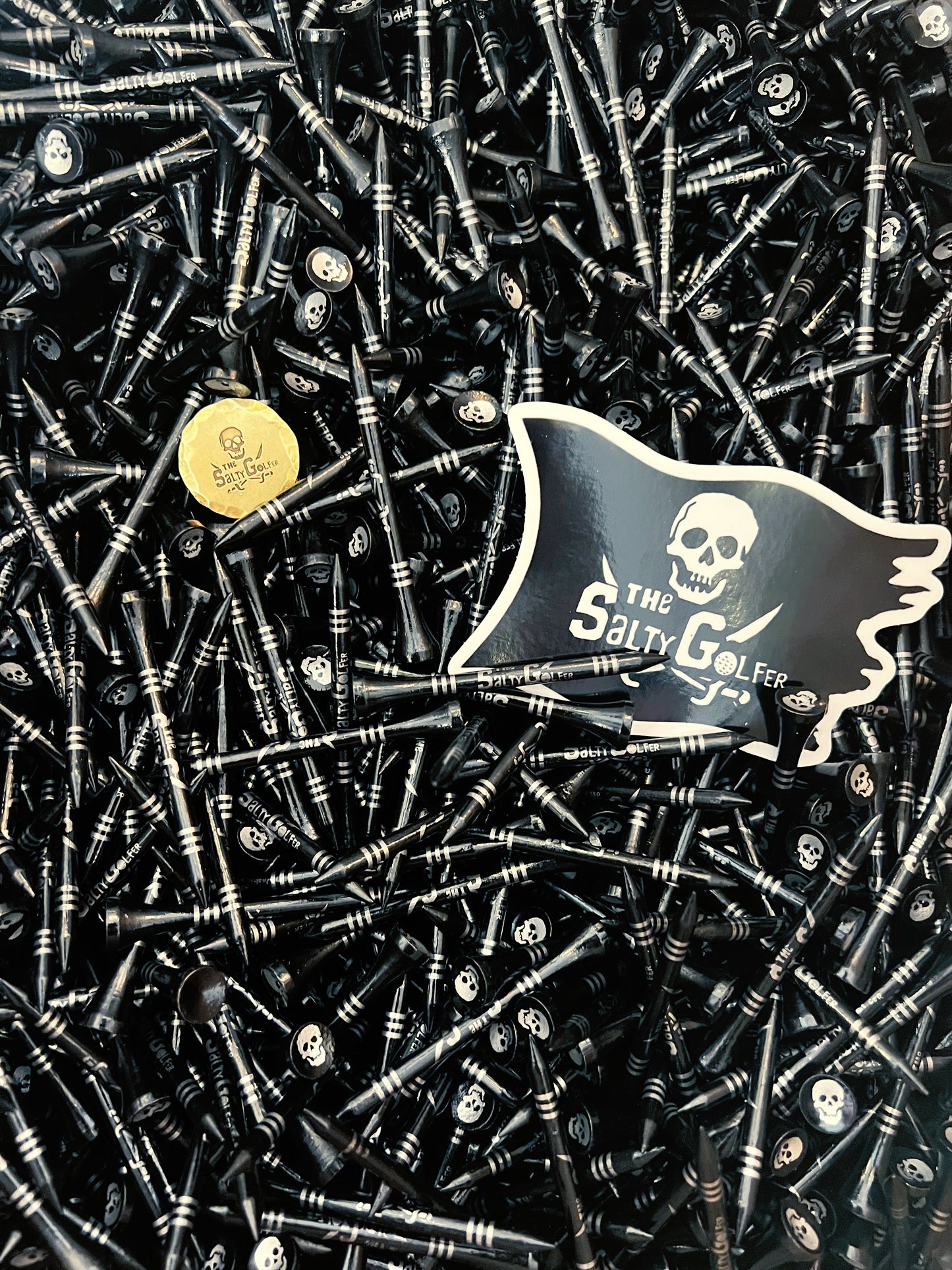 Salty’s gold ballmarker and tee pack